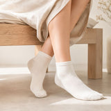 Chaussettes maille ajourée écru en laine et soie - Maison Broussaud Maison Broussaud Hersée Paris 9